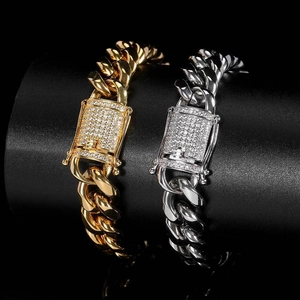Iced out 12mm Cuban link bracelets in gold and silver finish with diamond clasp