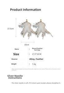 Detailed view of white feather earrings with gold alloy studs, sized 17.5x10cm