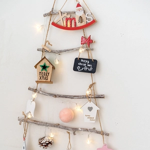 Handcrafted wooden Christmas tree wall hanging with pine cones and warm LED lights