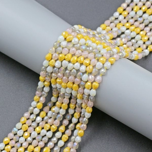 Gradient 4mm faceted teardrop crystal glass beads in yellow, white, and pink strands