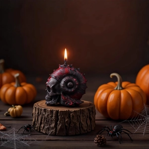 Dark gothic skull candle with ram horns on wood stump for Halloween table decoration