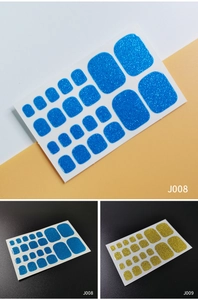 Close-up of blue and gold glitter toe nail stickers in models J008 and J009