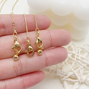 Adjustable 14k gold chain necklace with lobster clasp and silicone slider beads