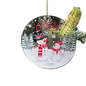 Acrylic Christmas dog wreath ornament with gold string and 2023 Merry Christmas print