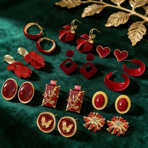 Elegant red flower petal tassel earrings with gold accents and vintage diamond inlay