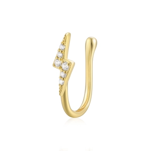 Close-up of gold-plated lightning bolt nose cuff with white cubic zirconia accents