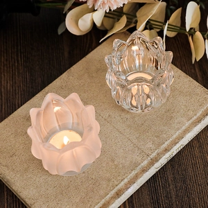 Lotus glass candle holders in clear and frosted finish for romantic table decor