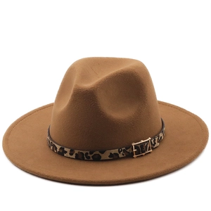 Close-up of brown wool fedora hat featuring leopard print band and gold buckle