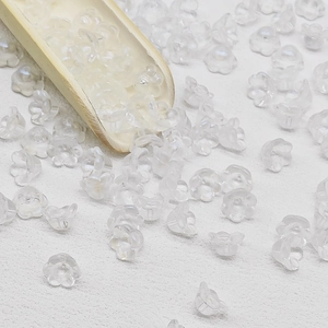 Macro shot of 7x12mm transparent lily of the valley beads for DIY jewelry making