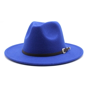 Close-up of royal blue wool jazz hat with dark brown leather band and silver buckle