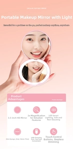 Pink portable LED makeup mirror with 2x magnification and step-less dimming controls