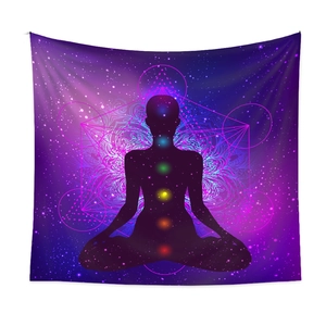 Detail of meditation tapestry showing seven chakras silhouette on starry purple background
