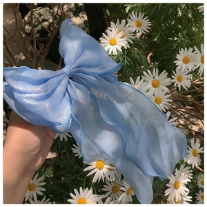 Sparkly blue mesh bow hair clip for women with elegant sheer fabric and ribbon streamer