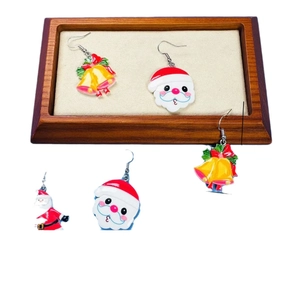 Cartoon Santa Claus and bells Christmas drop earrings in festive enamel metal finish