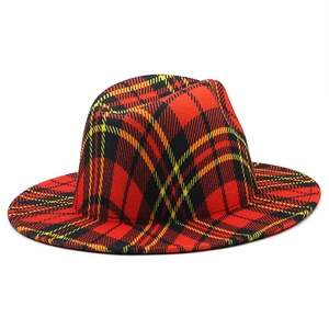 Detail of red Scottish plaid fedora hat with yellow and black cross-check pattern