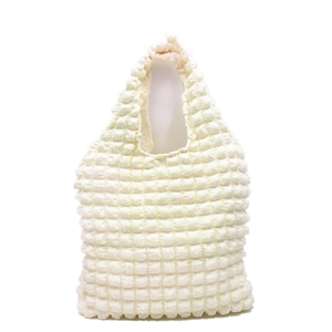 Creamy white popcorn textured tote bag with a minimalist bubble fabric design for women