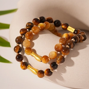 Tiger eye bead bracelets with golden fish charms and square blessing pendant in Maillard style