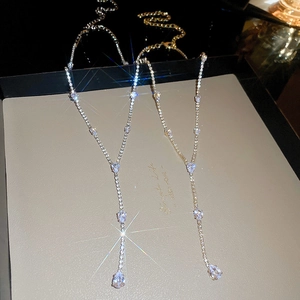 Elegant Y-shaped tassel necklace with pear-cut cubic zirconia in gold and silver finish