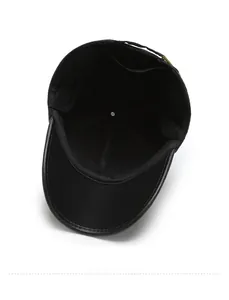 Macro shot of the quilted thickened lining and clean stitching of the black baseball cap