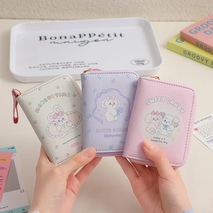Cartoon rabbit PU leather coin purses in white, purple, and pink with wrist straps