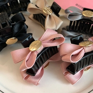 French vintage satin bow hair clips in pink, black, beige, and gray with metal buckles