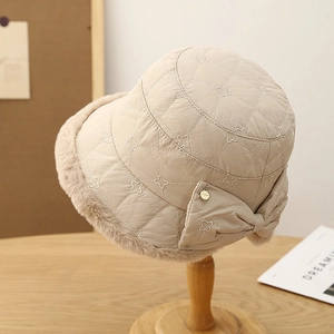 Quilted bow bucket hat in apricot for women with floral embroidery and faux fur trim