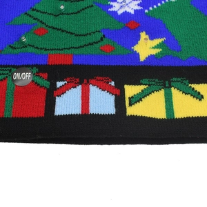 Detail shot of Christmas knitted hat showing LED lights, tree patterns, and ON/OFF switch