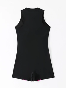 Detail view of black athletic one-piece swimsuit featuring pink striped leg hem accents