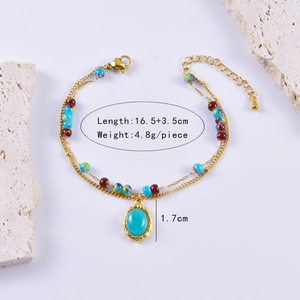 Detail of vintage beaded bracelet with blue gemstone pendant and size dimensions