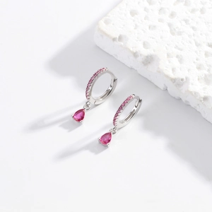 Detailed close-up of S925 silver hoop earrings with pink teardrop stones and zircon inlay