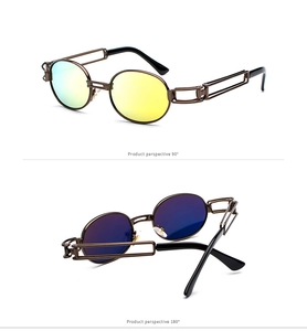 Macro view of steampunk sunglasses with metallic hollow frame and reflective round lenses