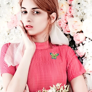 Sparkling butterfly brooch with colorful rhinestones on elegant apparel accessory