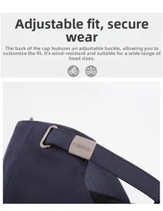 Detailed macro view of the adjustable silver metal buckle on a navy blue baseball cap