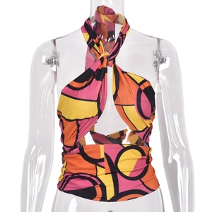 Detail of cross halter neckline and vintage geometric print on cropped tank top