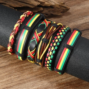 Set of 6 Jamaican reggae style woven leather bracelets for men on a display stand
