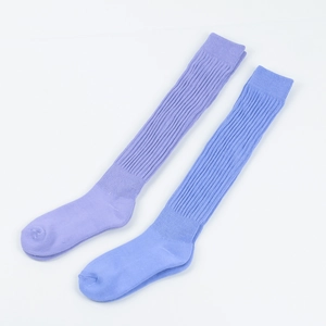 Detail of lavender and violet ribbed knit texture on thick thermal slouch socks