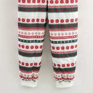 Pantaloni lounge natalizi rossi e verdi con motivi di renne e fiocchi di neve festivi