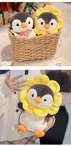Detail of plush penguin toys with sunflower headpiece and pink bow tie in a basket