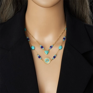Layered gold chain necklace with bohemian blue turquoise beads and sun pendant