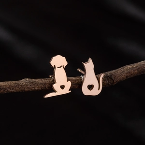 Rose gold asymmetrical cat and dog silhouette earrings with hollow heart design