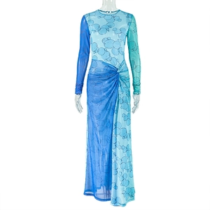 Detail of blue gradient print dress featuring ruched waist and side slit design