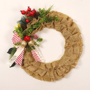 Christmas wreath with gold mesh, red berries, and Merry Christmas plaid ribbon door decor