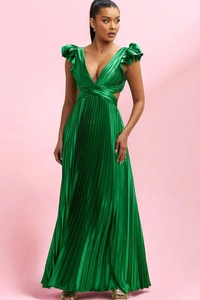 Detail of emerald green satin pleated dress showing deep V-neck and high waist fabric texture