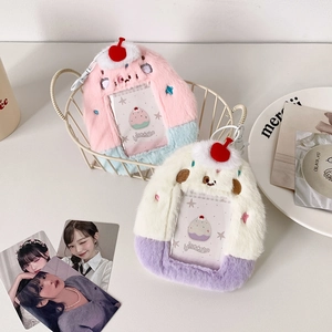 Detailed view of plush dessert style photo card holders with cherry charms and hanging loops