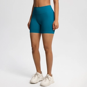 Detail of high waisted seamless gym shorts in lake blue featuring scrunch butt design
