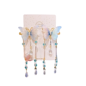 Blue butterfly tassel hair clips with iridescent wings and pearlescent beads for girls