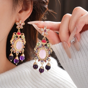 Vintage gold-tone earrings with pink oval stones, crystals and purple teardrop tassels
