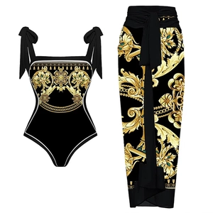 Maillot de bain une pièce baroque noir et doré avec jupe portefeuille longue assortie