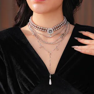 Luxurious multi-layer pearl necklace set with vintage square gray gemstone and silver chains