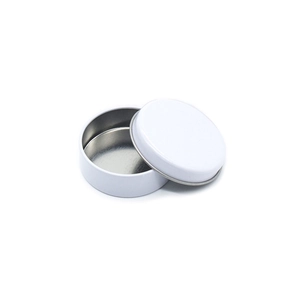 Macro detail of a 20g white round tin container with open lid showing metal interior